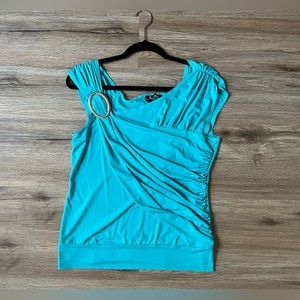 Size is Medium. A refreshing feeling turquoise colored Blouse.